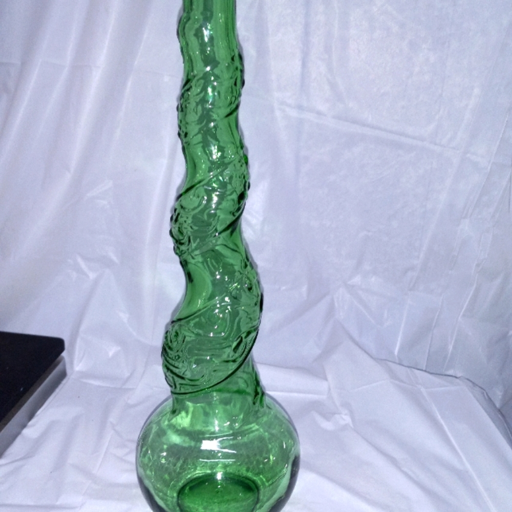 Vintage decorative green glass bottle